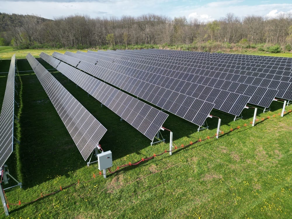 Land lease for solar farm - picture shows a few acres of solar power arrays